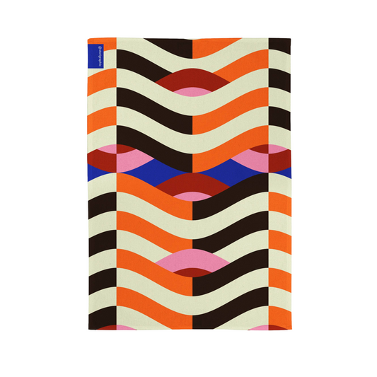 Flat image of colourful tea towel in red, orange, black, white and blue striped wavy design 