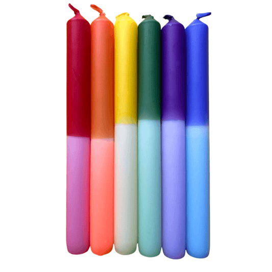 Set of 6 colorful candles with gradient shades on a white background