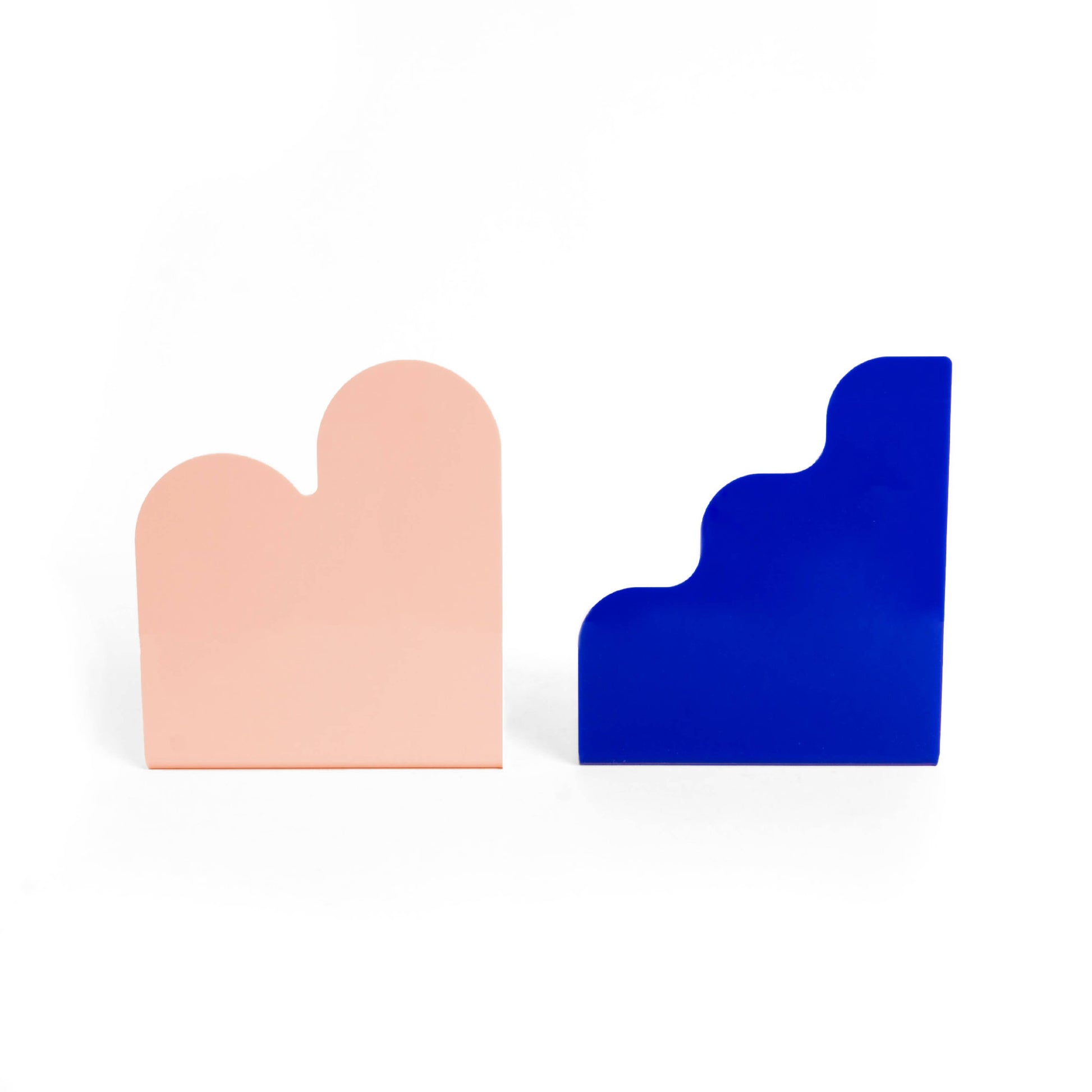 Two geometrically shaped bookmarks, one pink and one blue, on a white background.