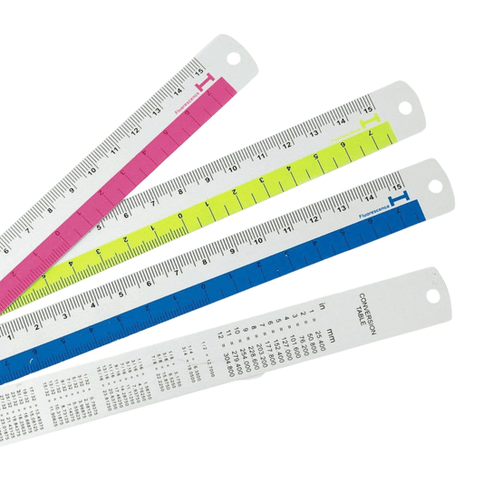 Set of four colorful rulers on a white background